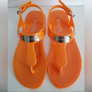 Michael Kors Orange Jelly T-Strap Sandals with Silver Nameplate